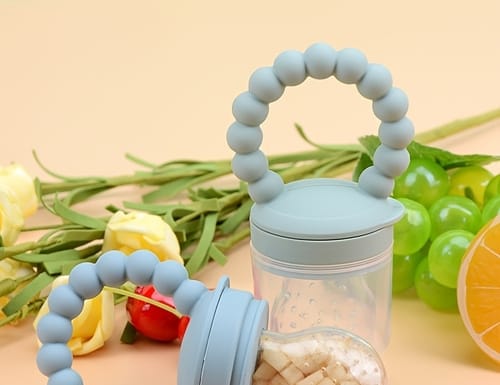 Yippiez - Fruitfopspeen en Bijtring in Eén - Fruitfopspeen - Babyfruitvoederfopspeen Roze of Blauw - Voor Baby’s vanaf 4 Maanden