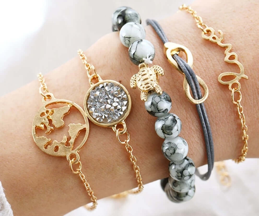 Joboly Set armbanden infinity love hartje diamant wereldbol schildpad 5 delig Dames Goudkleurig