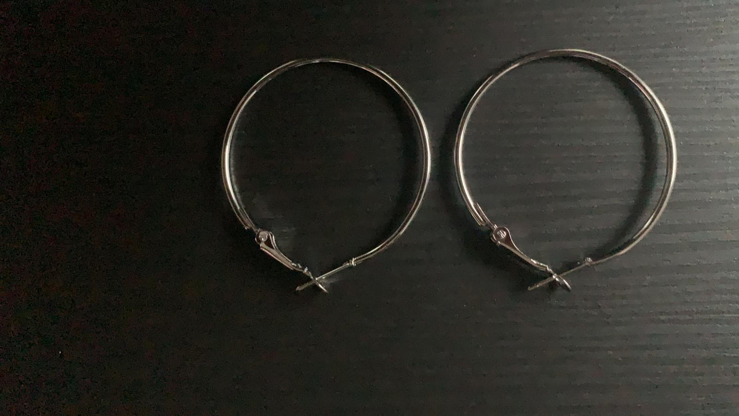 Grote ronde ringen oorbellen zilverkleurig